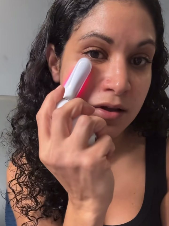 Red light on the cheek, mid-session.